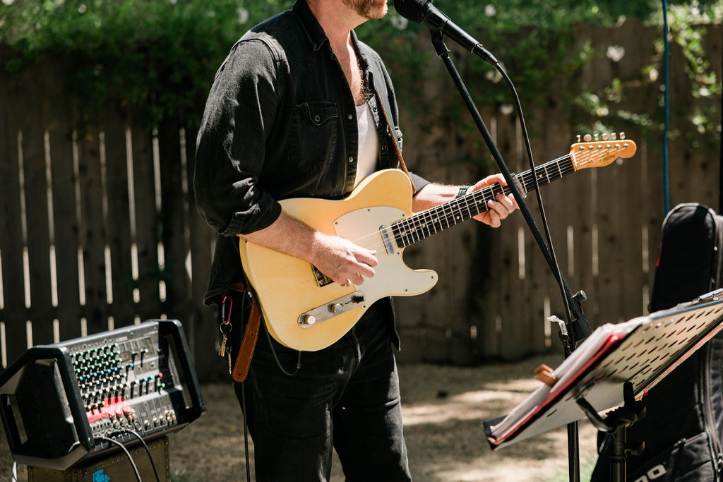 A musician playing guitar