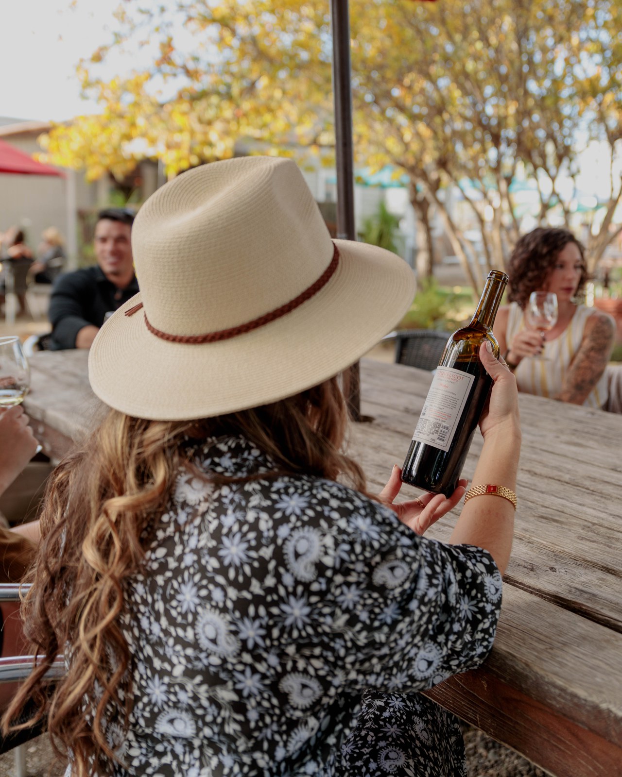 Guests tasting wine in the garden
